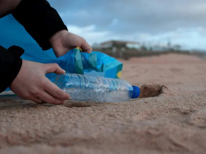 What are the environmental benefits of keeping our beaches clean?