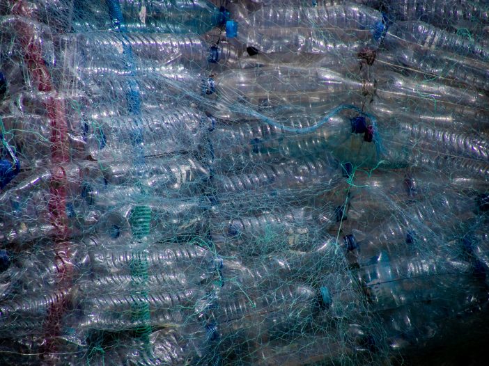 Do The Benefits Of Recycling Outweigh The Costs? A pile of discarded plastic bottles